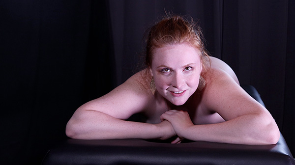 A closeup look at Ginger on the massage table during her thrid erotic hypnosis sessions.